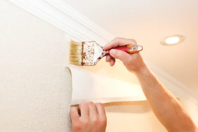 Pose de papier peint à Noailly — revêtements muraux et toiles de verre